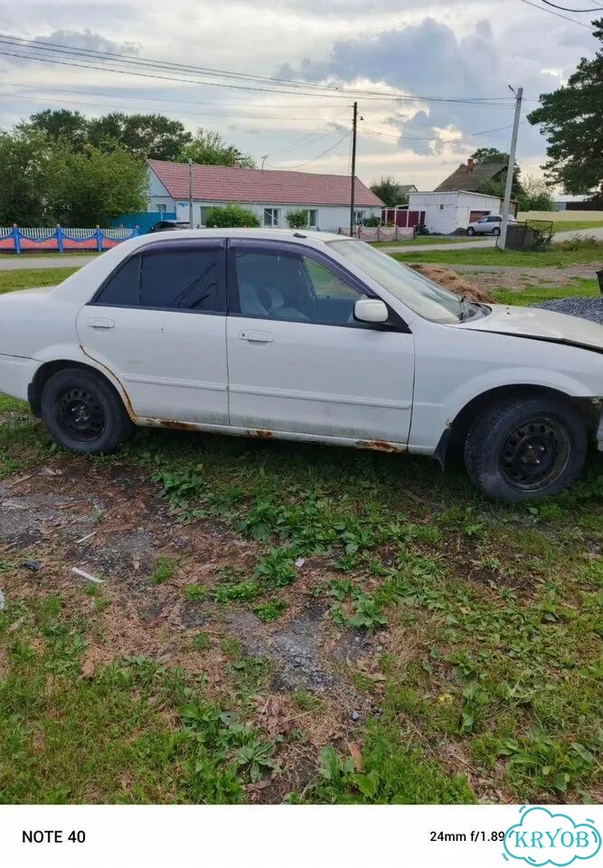 Mazda Familia 1.5 AT, 1999, битый, 300 000 км фото 2