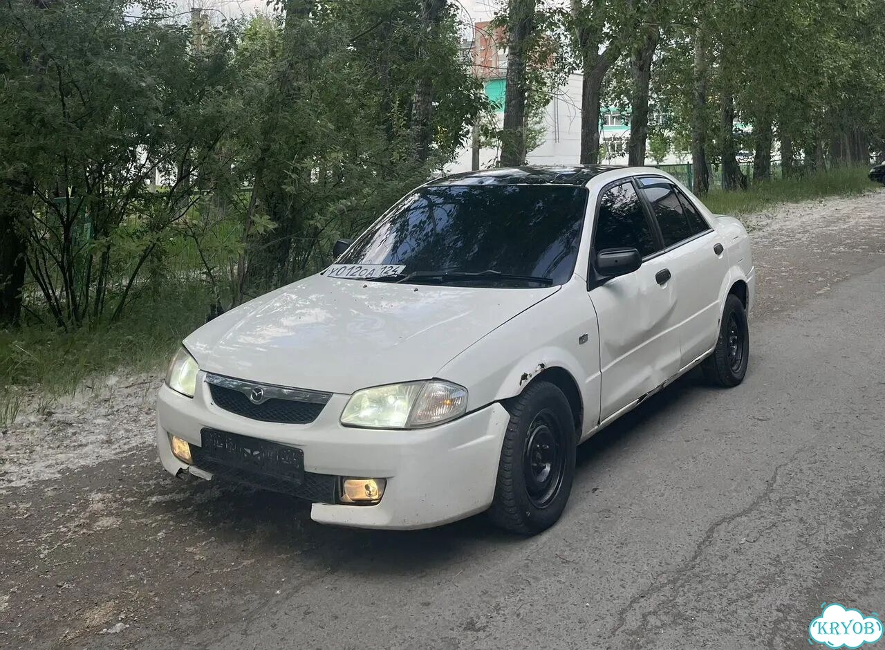 Mazda Familia 1.5 AT, 1999, 123 456 км фото 1
