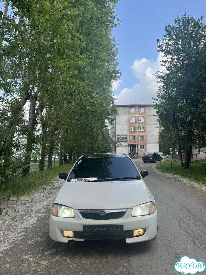 Mazda Familia 1.5 AT, 1999, 123 456 км фото 2