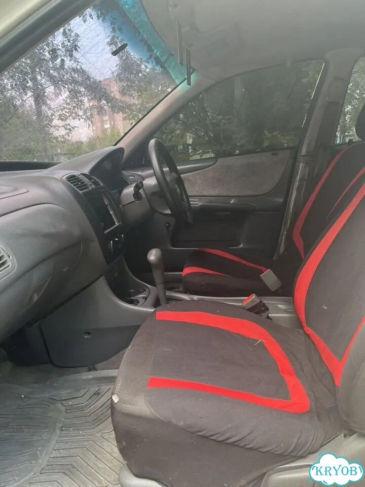 Mazda Familia 1.5 AT, 1999, 123 456 км фото 8