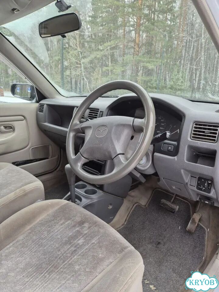 Mazda Demio 1.3 AT, 1999, 169 096 км фото 7