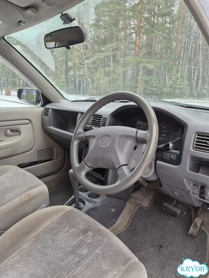 Mazda Demio 1.3 AT, 1999, 169 096 км фото 8