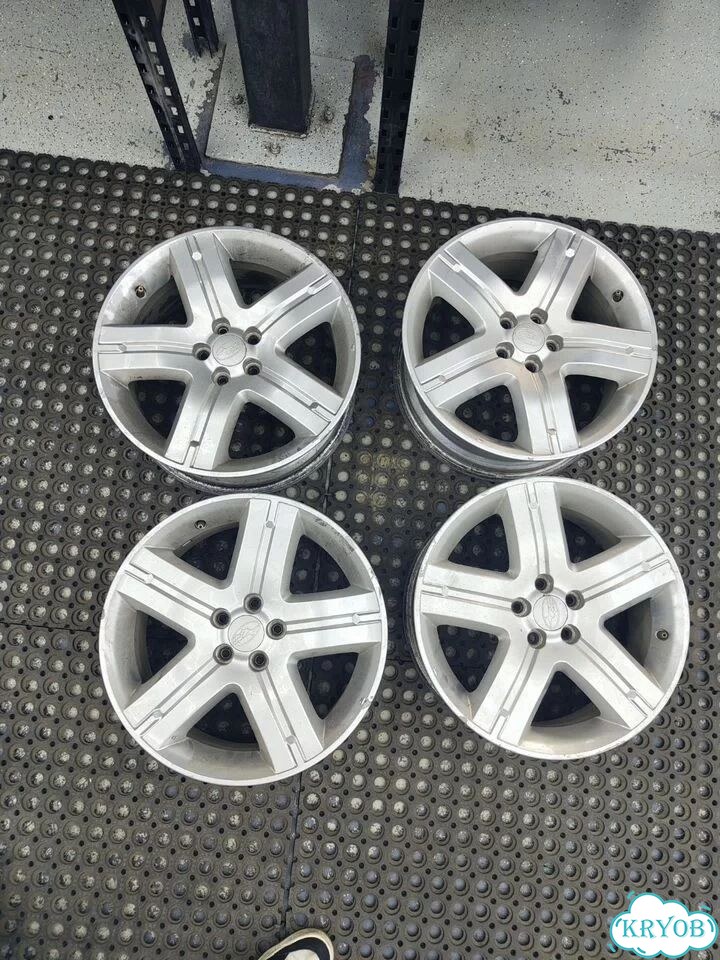 Литые диски Subaru 7×R17 5×100 фото 1