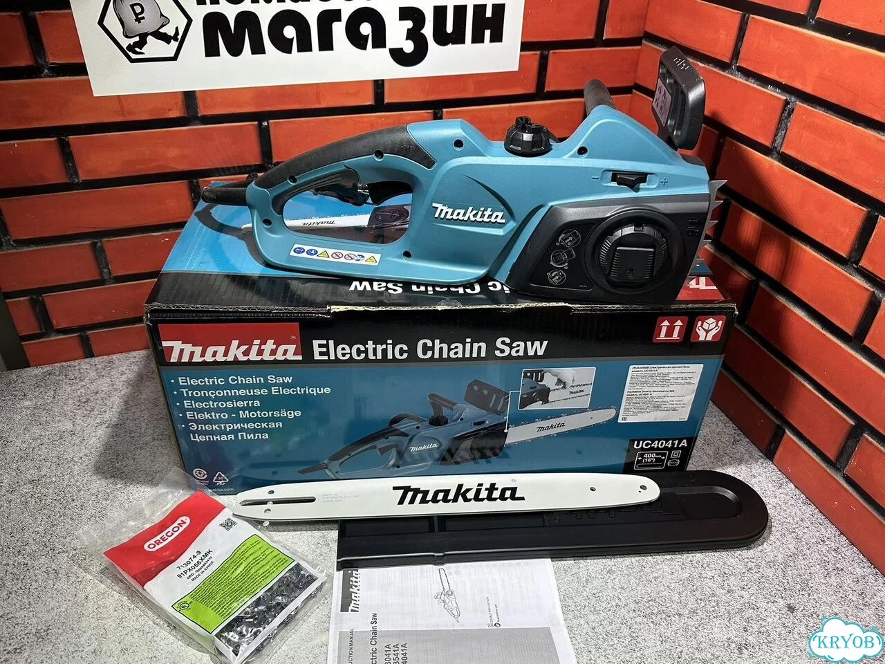Электрическая цепная пила Makita UC4041A фото 1