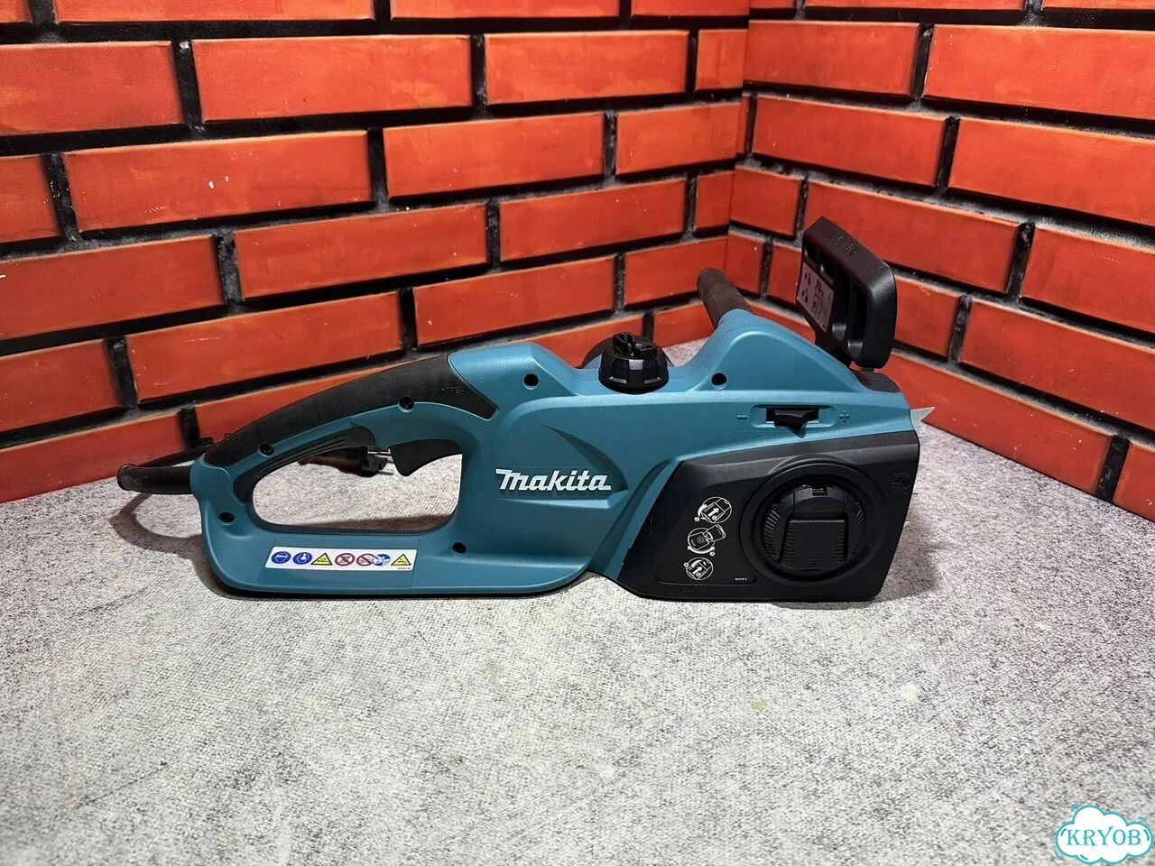 Электрическая цепная пила Makita UC4041A фото 2