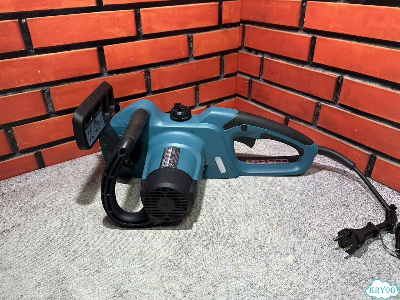 Электрическая цепная пила Makita UC4041A фото 3