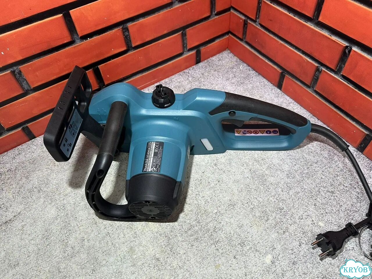 Электрическая цепная пила Makita UC4041A фото 4
