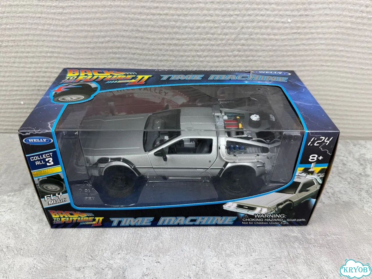 Модель DeLorean Welly 1:24 Назад в будущее новая фото 1