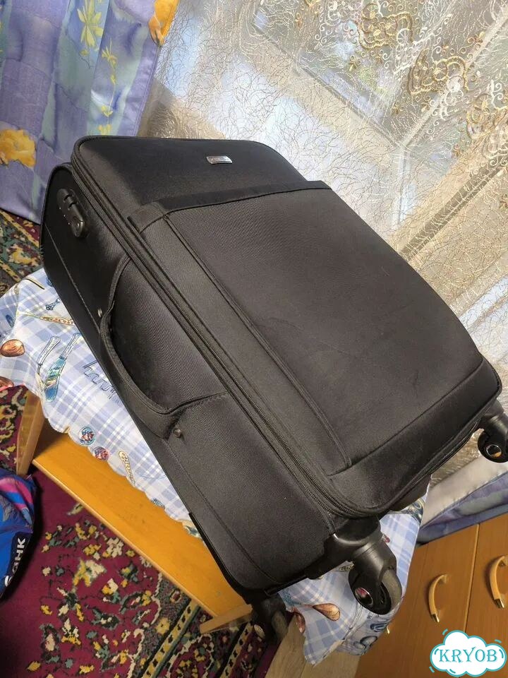 Чемодан на колесах бу фото 5